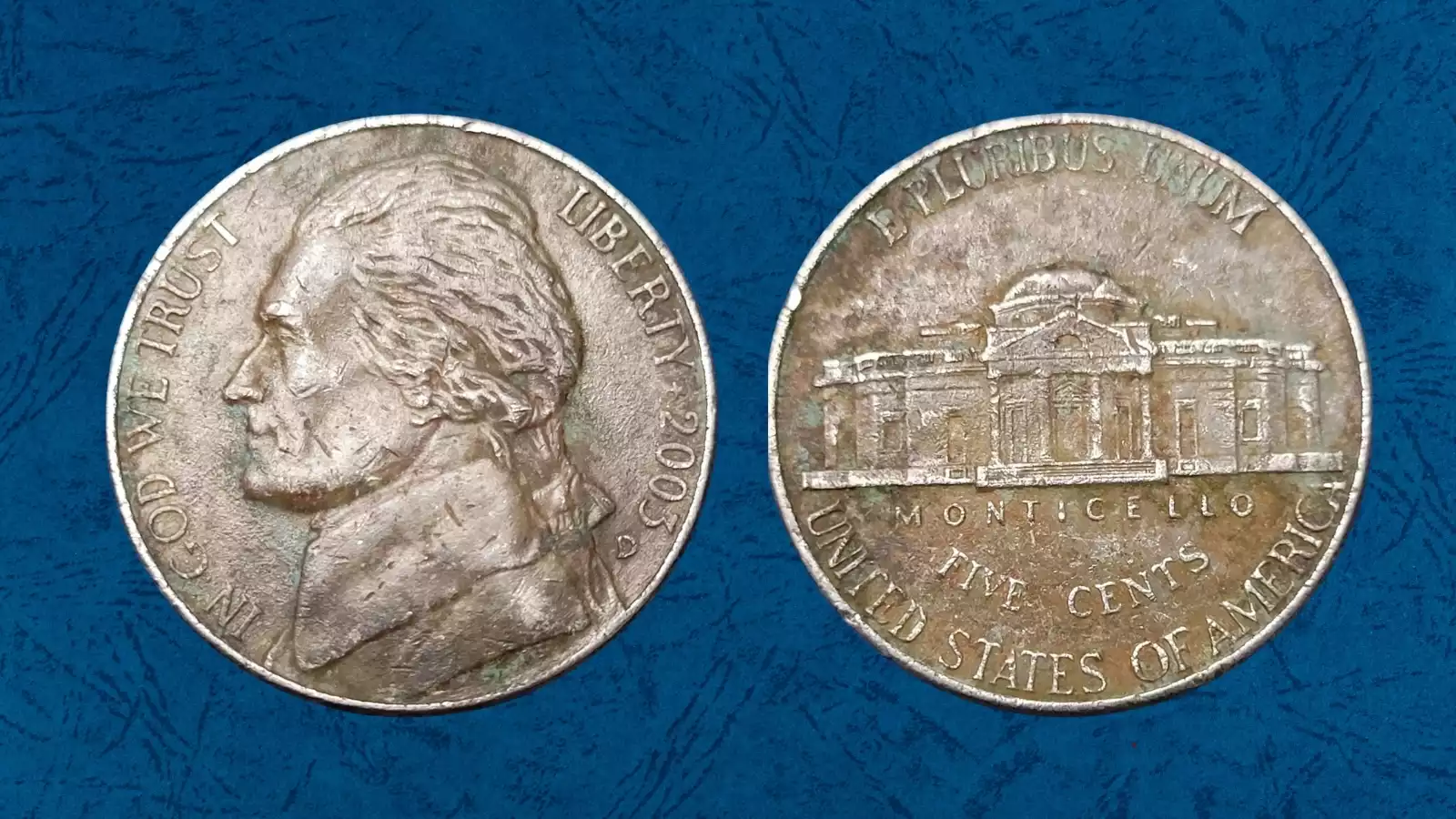 2003 Jefferson nickel die clash error showing ghost impression of opposing die design in the coin's field