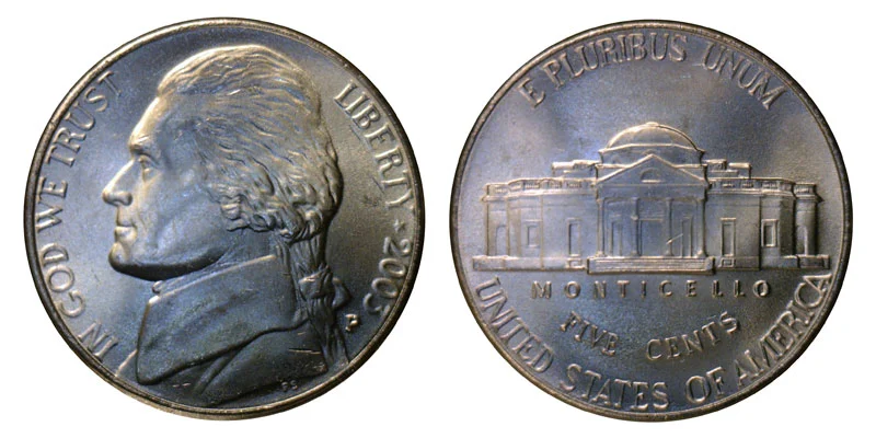 2003 Jefferson nickel grading strip showing four condition tiers from worn to gem uncirculated